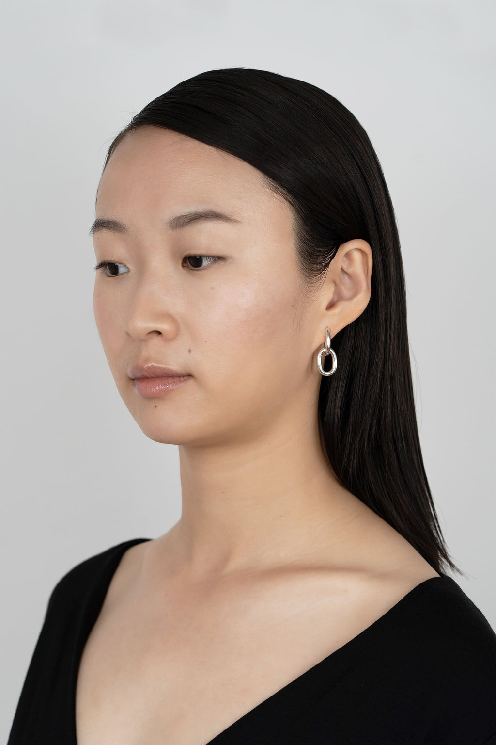 Boucles d'oreilles Capsule en argent recyclé, sur fond clair