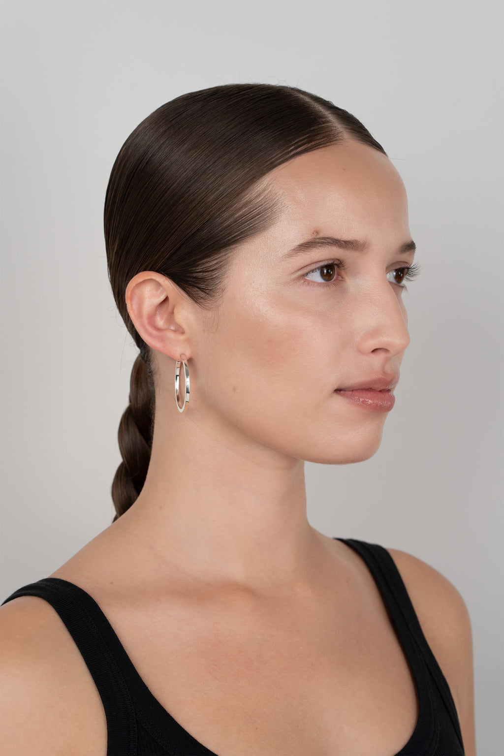 Boucles d'oreilles Club en argent recyclé, sur fond clair